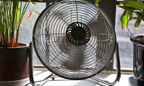 June Blog Big Black Fan in an apartment